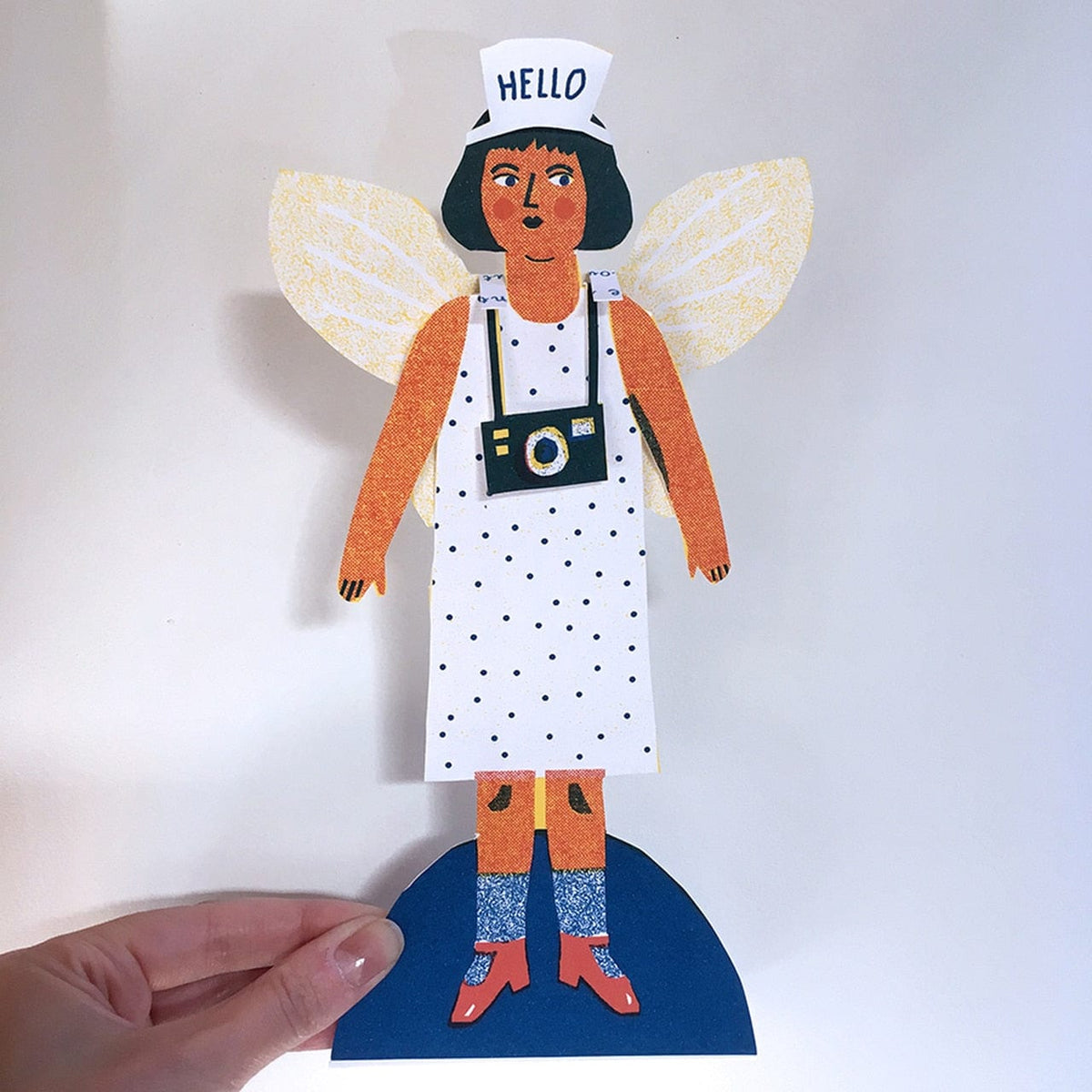The Printed Peanut Cut Out and Dress Up Paper Doll