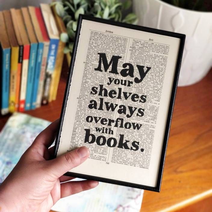 Bookishly 'May your shelves always overflow with books' Framed Book Page Print