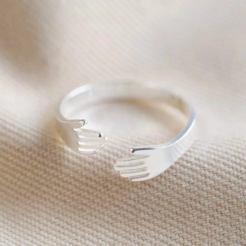Lisa Angel Silver Hug Hands Ring